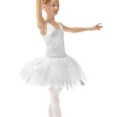Young beautiful ballerina dancer posing on light background